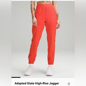 Lululemon NWT - size 10 solar orange. Adapted state high rise jogger *airflow